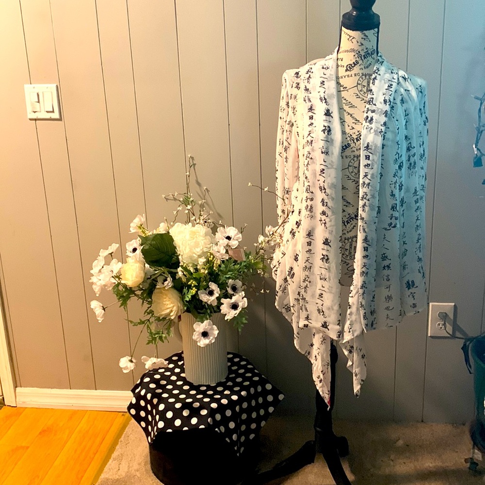 Gorgeous Asian-inspired cover up. Beautiful over a black sleeveless top